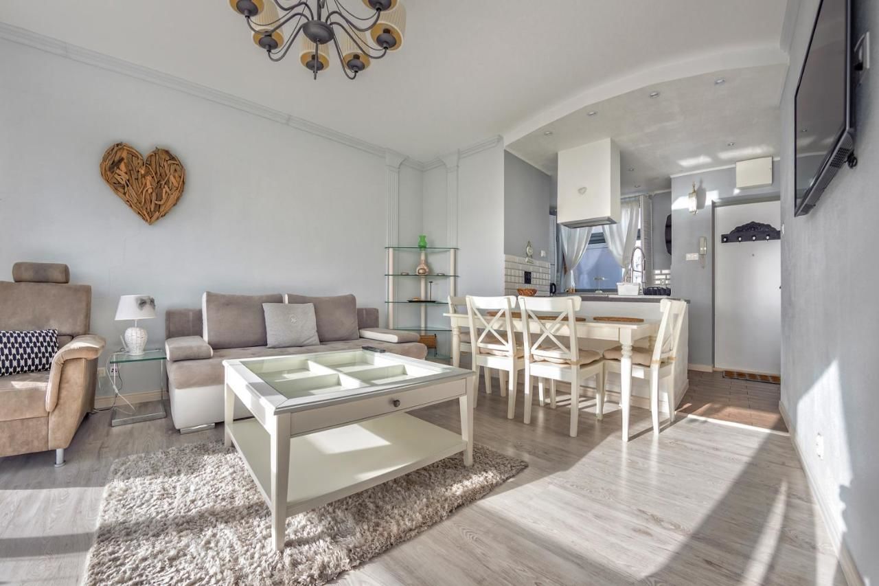 Апартаменты Apartamenty Sun & Snow Międzyzdrojski Rynek Мендзыздрое